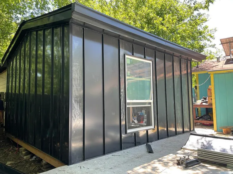 Black standing seam metal wall panels for Metal Roof Installation in Becker