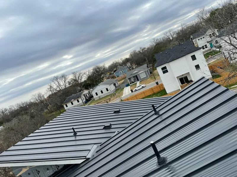 Standing seam metal roof panels with vents for Skylight Repair in Becker